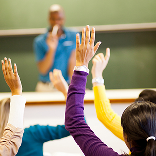 hands being raised in class